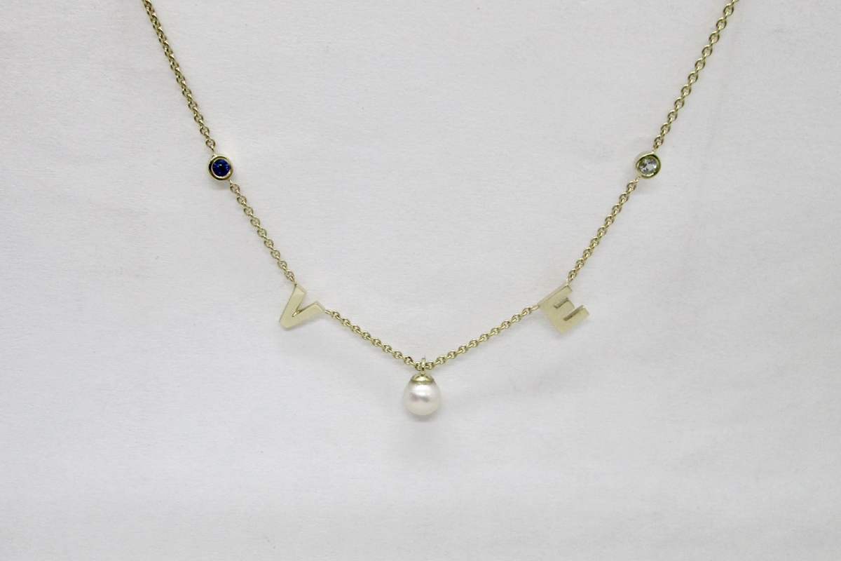 Kette Buchstaben Gelbgold Saphir Topas Perle  - Wien